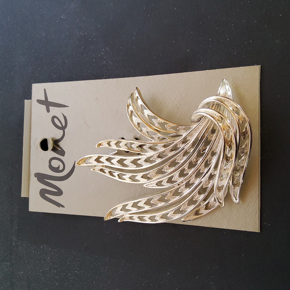 Monet large feather brooch.